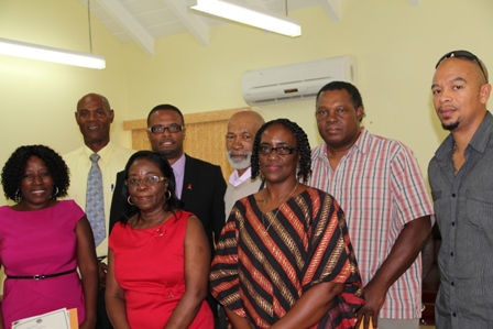 Newly installed Board of Directors for the Nevis Cultural Development Foundation with Deputy Premier and Minister of Culture in the Nevis Island Administration Hon. Mark Brantley (back row second from left) moments after their installatio. (L-R back row) Mr. Abdul Karim Ahmed, Mr. Amba Trott, Mr. Marcus Hull and Mr. Patrick Howell. (L-R front row) Board Chairperson Mrs. Jeanette Maloney, Ms. Elmeader Brookes and Board Secretary Mrs. Jacqueline Jeffers